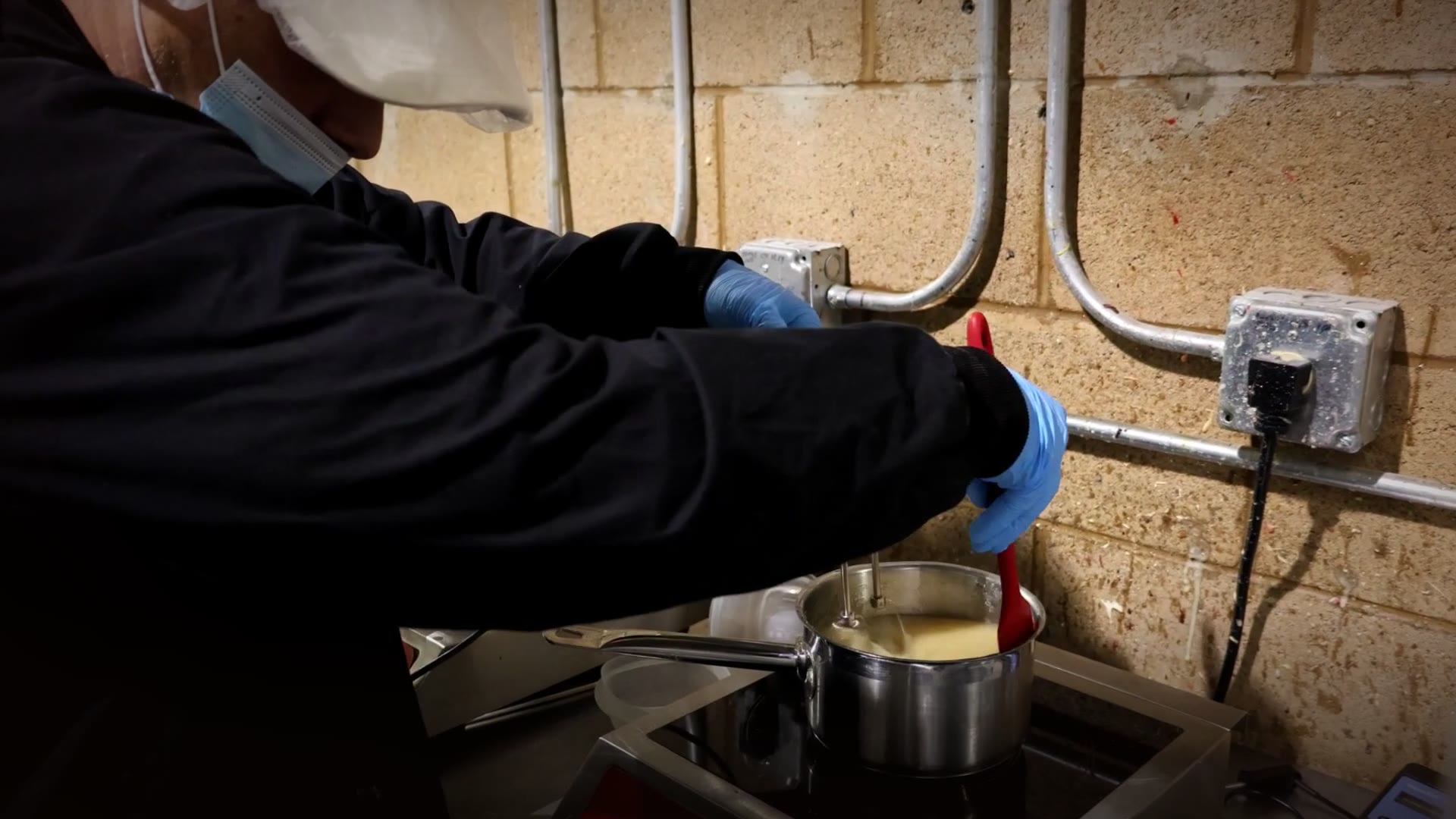 Operator weighing and dosing ingredients